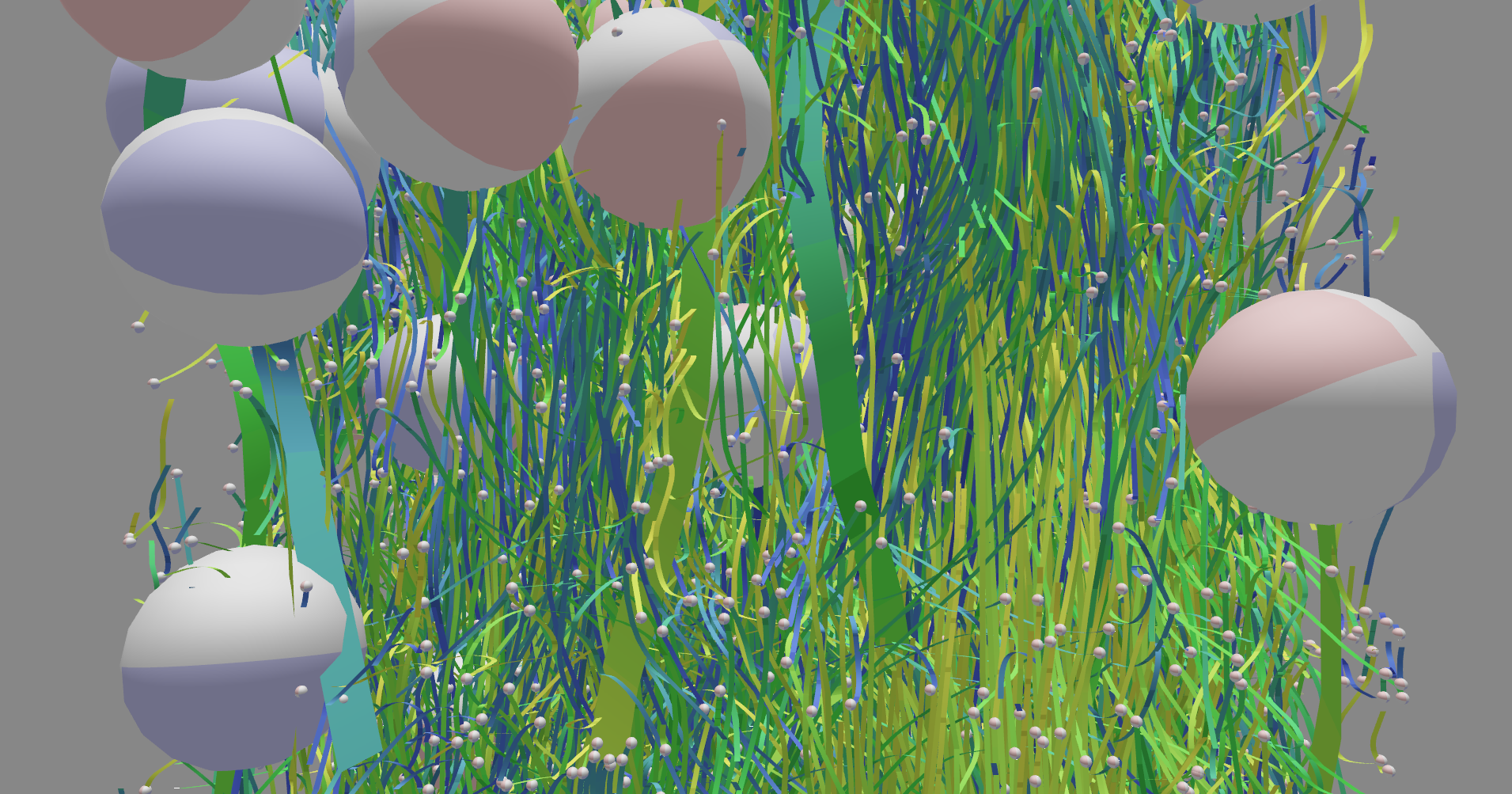 Teaser image for the project: An image of trajectories of particles of a flotation simulation visualized as blue-green-yellow ribbons.